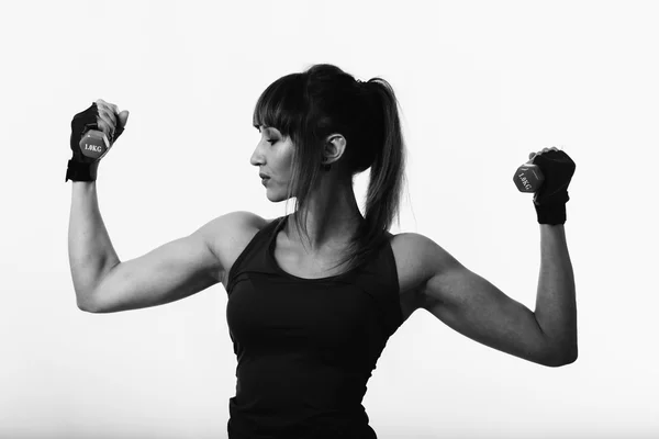 Sexy mujer Fitness sobre un fondo claro . — Foto de Stock