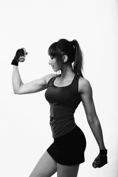 Sexy žena Fitness na světlém pozadí. — Stock fotografie