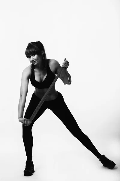 Fitness girl posing on black — Stock Photo, Image