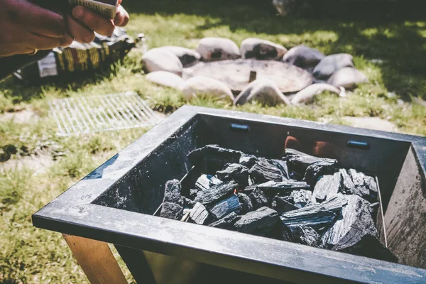 Grill burning, camping. Portable barbecue