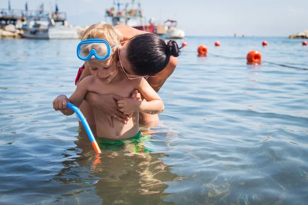 Mother and son in water — Stock Photo, Image