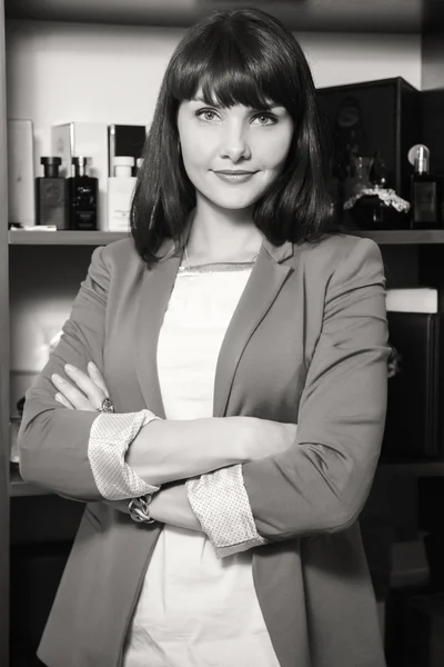 Business woman near the closet with the spirits — Stock Photo, Image