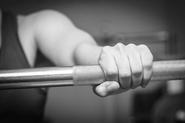Strong man training in gym — Stock Photo, Image