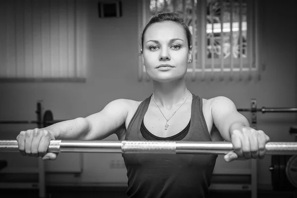 Blonde woman working out  with weights — Stock Photo, Image