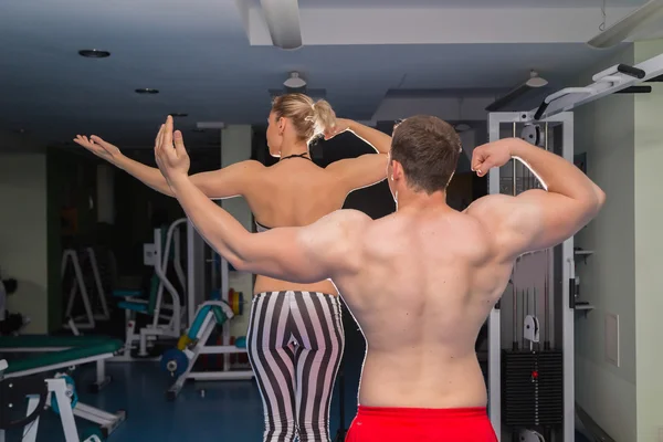 Sporty man and woman — Stock Photo, Image