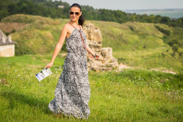 Woman on stone road — Stock Photo, Image