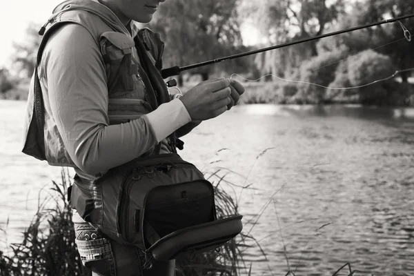 Fisherman on the river bank. — Stock Photo, Image