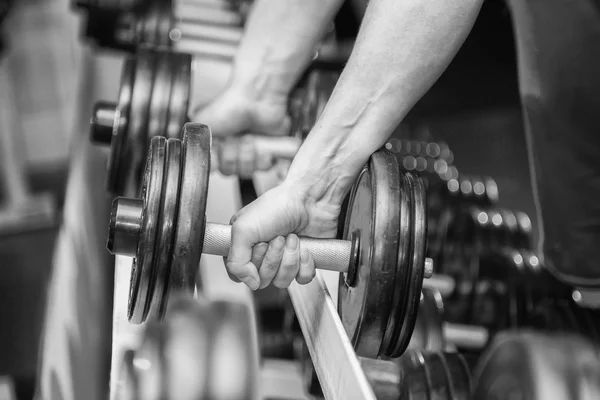 Hands holding dumbbell. — Stock Photo, Image