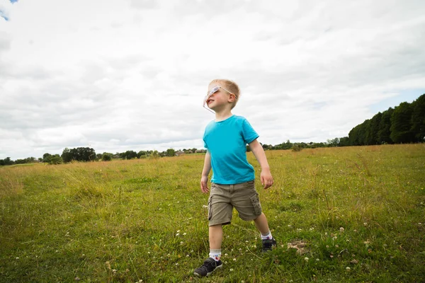 Young boy wearing sunglasses. — Stock Photo, Image