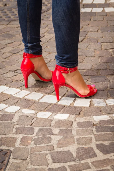 Woman legs in red high heel shoes — Stock Photo, Image