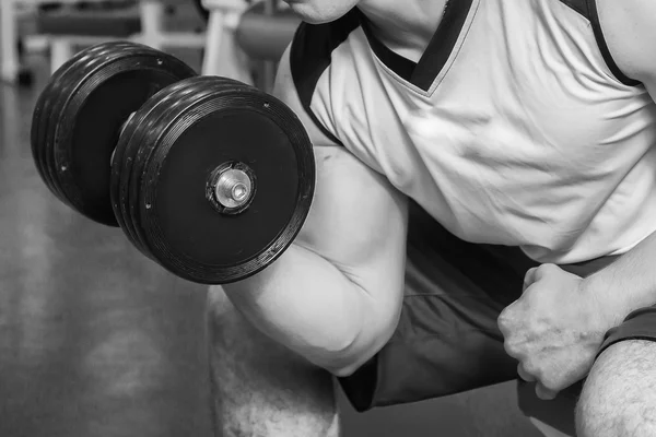 Man working out with dumbbells — Stock Photo, Image