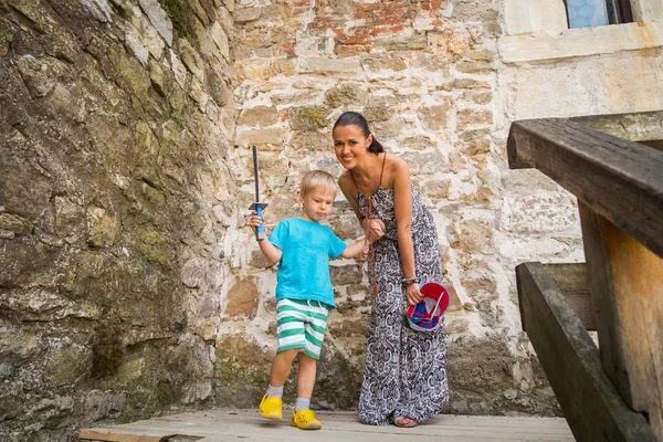 Mom and son in medieval fortress — Stock Photo, Image