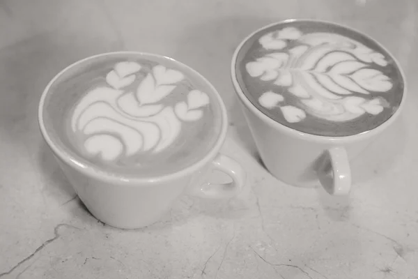 Cups of coffee on table — Stock Photo, Image