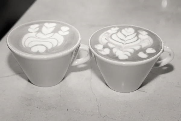 Cups of coffee on table — Stock Photo, Image