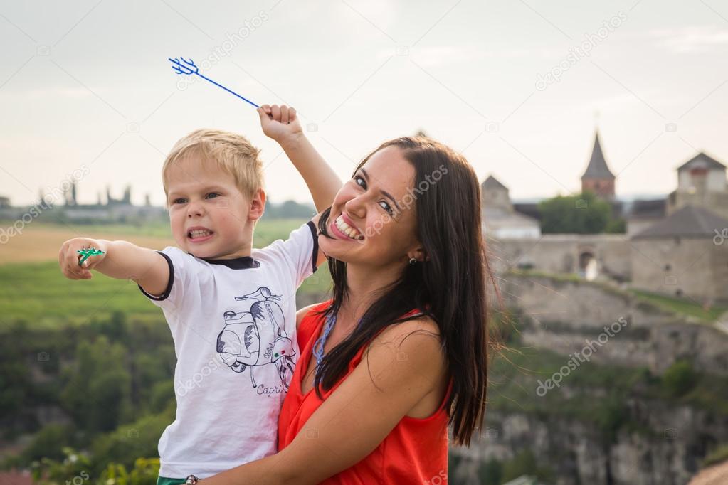 Mom and son travel.