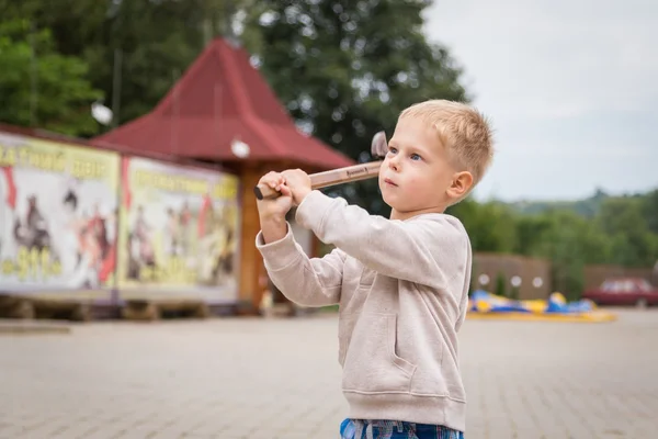 Little boy holding an axe — Stock Photo, Image