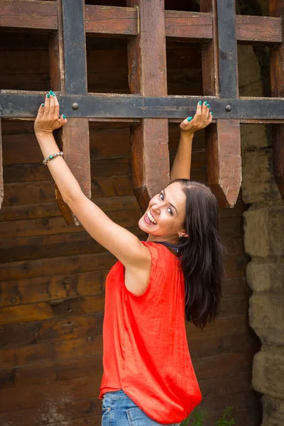 Woman at the gates — Stock Photo, Image