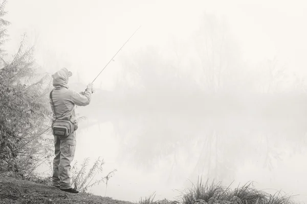 Pescatore con filatura — Foto Stock