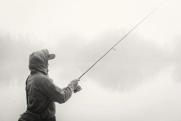 Pescatore con filatura — Foto Stock