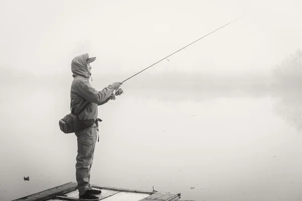 Pescatore con filatura — Foto Stock