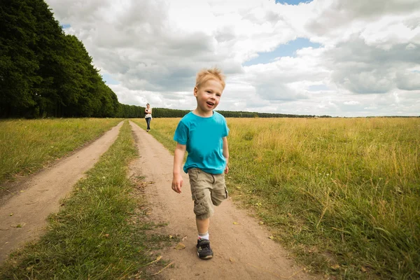 Boy running in nature — Stock Photo, Image