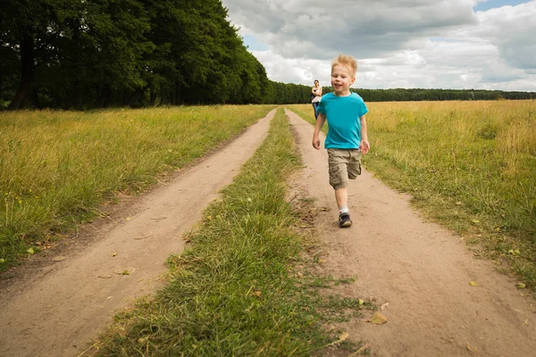 Boy running in nature — Stock Photo, Image
