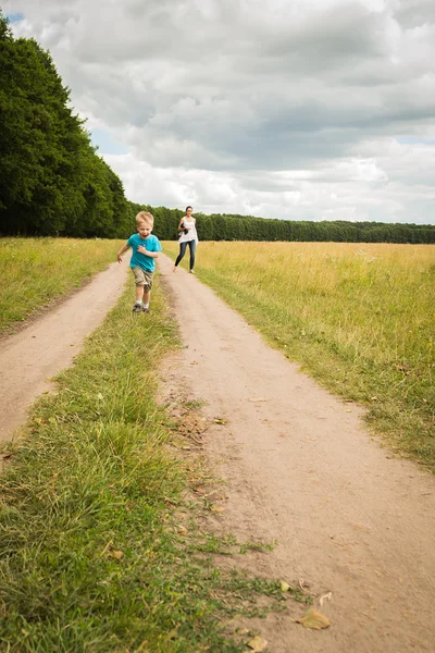 Boy running in nature — Stock Photo, Image