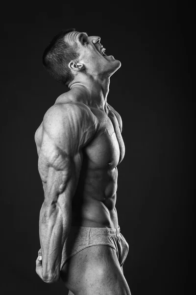 Muscular man bodybuilder — Stock Photo, Image