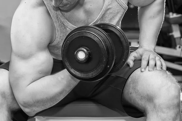 Adam holding dumbbell heyecanlı — Stok fotoğraf