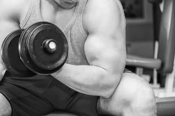 Adam holding dumbbell heyecanlı — Stok fotoğraf