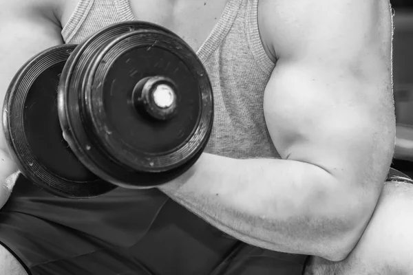 Adam holding dumbbell heyecanlı — Stok fotoğraf