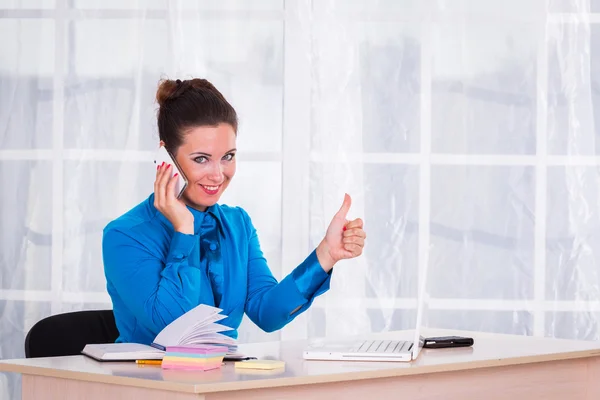 Emotional businesswoman working in office — Stock Photo, Image