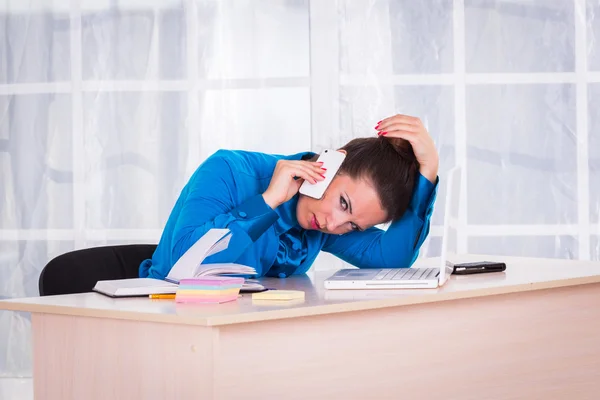 Emotional businesswoman working in office — Stock Photo, Image