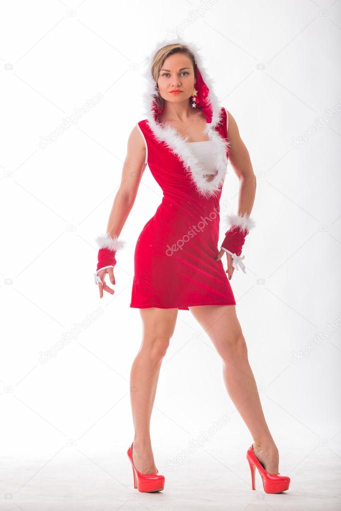 Athletic blonde in a Christmas costume — Stock Photo © aallm 58913749