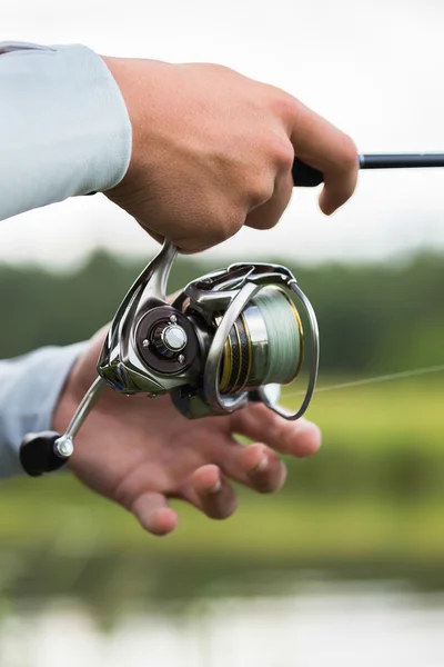 Pescador con caña de pescar — Foto de Stock