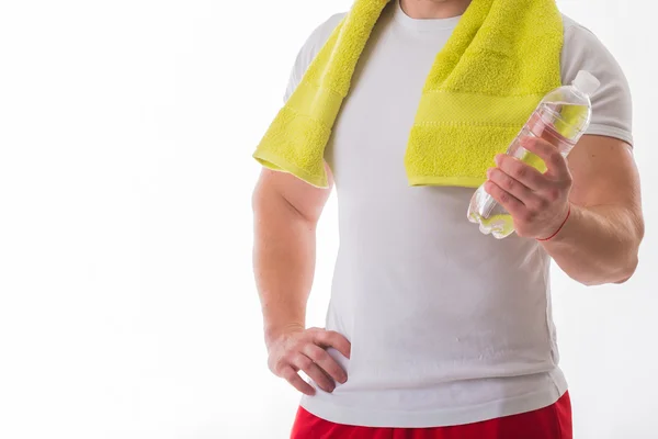 Bodybuilder with bottle of water — Stock Photo, Image