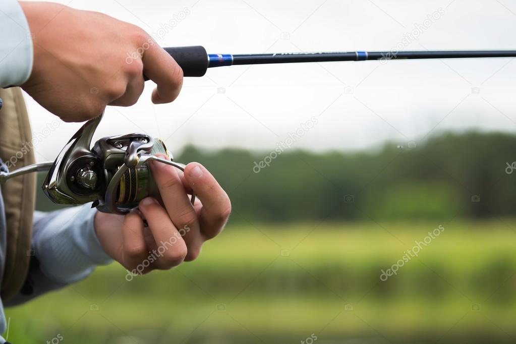 Fisherman with a fishing rod