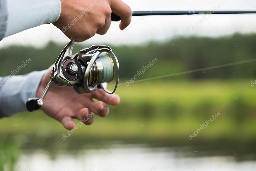 Fisherman with a fishing rod