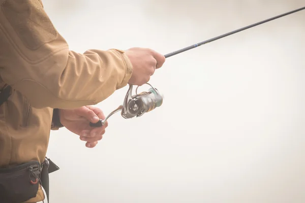 Pescatore con filatura — Foto Stock