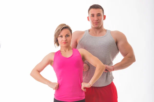 Athletic couple in sportswear — Stock Photo, Image