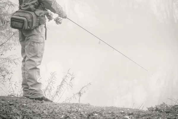 Fisherman with spinning — Stock Photo, Image