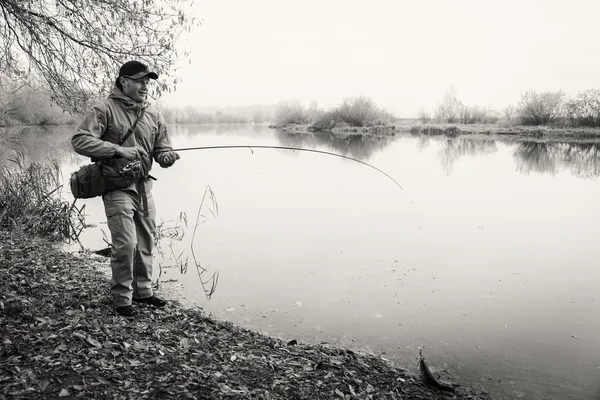 Pescatore con filatura — Foto Stock