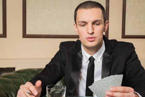 Poker player in the casino — Stock Photo, Image