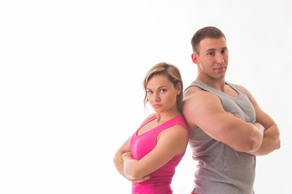 Athletic couple in sportswear — Stock Photo, Image