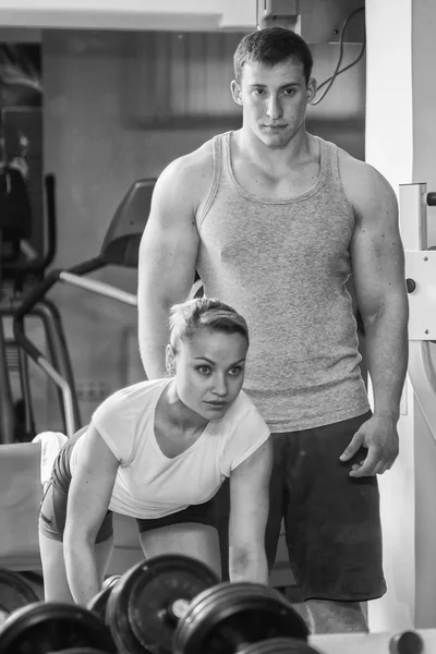 Man and woman trained in gym — Stock Photo, Image