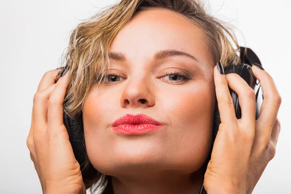 Gorgeous blonde in headphones — Stock Photo, Image