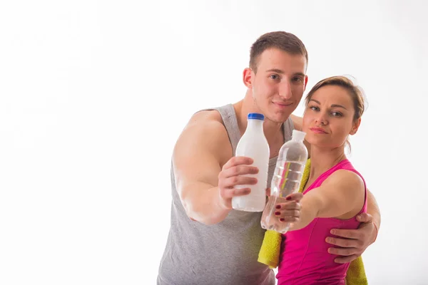 Man and woman with milk and water — Stock Photo, Image