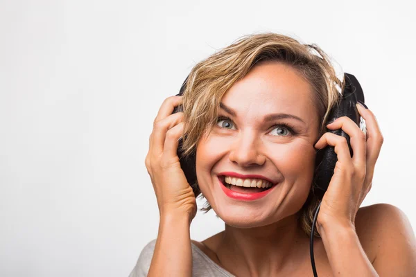 Gorgeous blonde in headphones — Stock Photo, Image