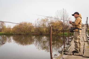 iplik ile balıkçı