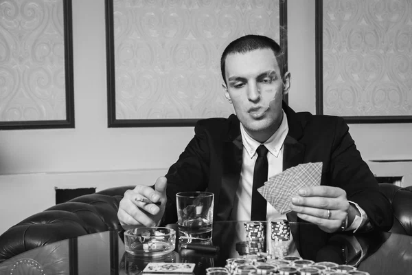 Poker player in the casino — Stock Photo, Image